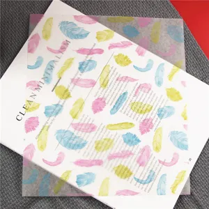 Colorful feather baking wax paper detail shot, translucent greaseproof sandwich wrapping paper.