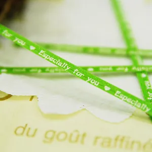 Green paper twist ties with Especially for you text, ideal for gift sealing and packaging.