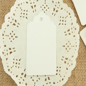 Blank white paper hang tags with decorative flower head edges for baking and crafts.