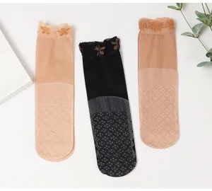 Women ultra-thin summer sheer lace socks with anti-slip bottom and floral ruffle cuff.