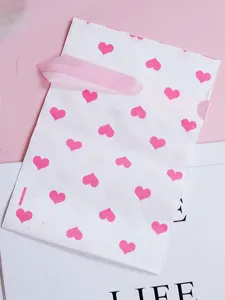 Roze hartje koordtas voor cadeauverpakking, schattig hartvormig zakje voor cosmetica.
