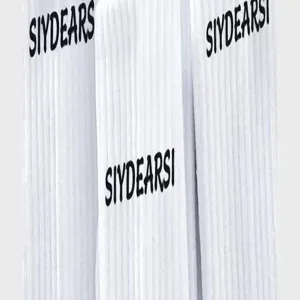 White ribbed long socks with letter print, high-fashion cotton daily sports wear detail view.