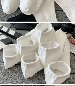 Detail shot of white low-cut ankle socks showing breathable cuff and neat fabric texture.