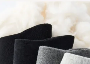 Close-up detail of soft knit men socks fabric, breathable texture, comfortable daily wear.