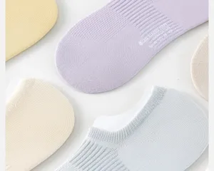 Close-up detail of breathable mesh cotton boat socks in pastel colors for women, soft and cool.