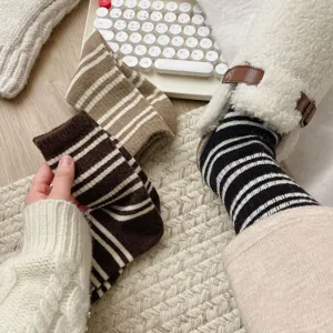Cozy thick knit striped mid-tube socks detail view, showing soft winter fashion style.