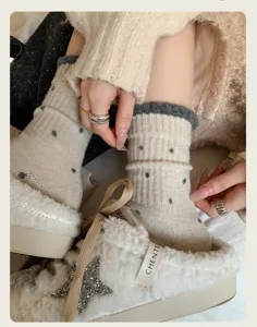 Cozy vintage polka dot knit socks close-up, soft touch, perfect for winter daily wear.