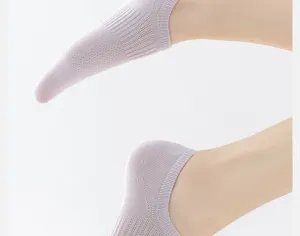 Close-up detail of breathable mesh ankle socks in light purple, showcasing fine knit texture.