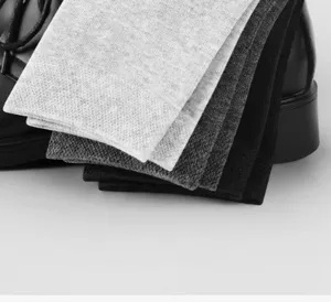 Detail view of men's crew socks in versatile gray and black colors, featuring knit texture.