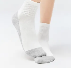 White mid-tube socks detail view with grey heel and toe contrast design breathable cotton.