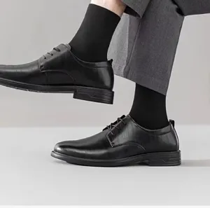 Men's business casual leather shoes paired with comfortable socks for daily office and formal wear.