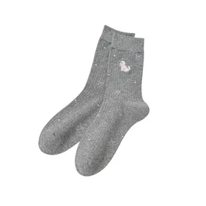 Grey ribbed mid-tube socks featuring cute puppy embroidery and bows, sweet style for daily wear.