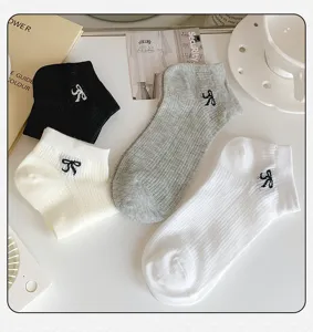 Fine striped mesh short socks with cute bow embroidery, breathable summer socks, detail view.