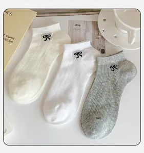 Korean style breathable mesh short socks for women featuring cute bow embroidery and fine stripes.