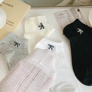 Korean style hollow breathable short socks with cute bow embroidery for women summer wear.