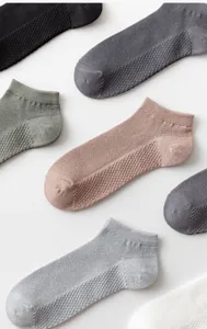 Detailed view of summer thin mesh breathable short socks, low cut design, solid color.