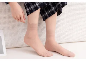 Detailed view of women's ultra-thin nude sheer short socks, breathable and smooth fabric.