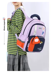 Stylish multi-compartment student backpack in purple and blue, lightweight and casual.