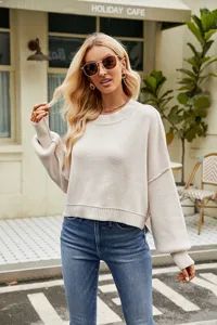 Casual off-white crewneck sweater for women, comfortable long sleeve knitted pullover top.