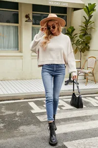 Casual oversized cropped crewneck knit sweater for women, comfortable long sleeve autumn top.