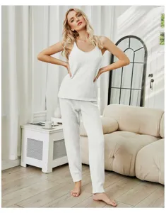 Detail view of women's fuzzy knit camisole loungewear set in solid white for winter.