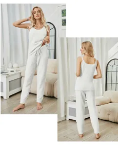 Soft fuzzy loungewear set for women featuring a cozy cami top and matching pants, white.