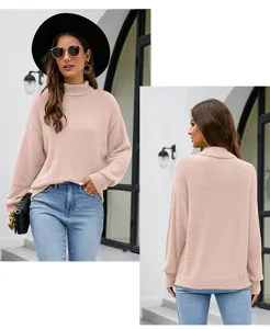 Women solid color turtleneck long sleeve knit sweater detail view showing fabric and design.