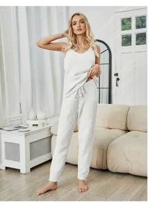 White fuzzy knit camisole pajamas set for women, cozy winter sleepwear loungewear details.