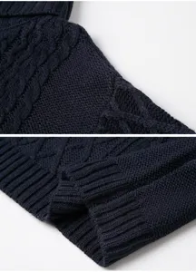 Dark blue women cable knit sweater detail close up, soft turtleneck pullover cuff view.