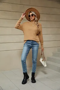 Stylish solid color boat neck long sleeve sweater for women, perfect for autumn daily wear.