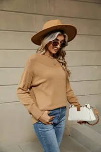 Solid color boat neck long sleeve knit sweater for women, comfortable casual pullover top.
