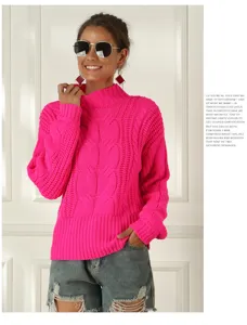 Detailansicht des neonpinken Zopfstrick-Pullovers mit warmem Stehkragen für Damenmode.