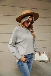 Solid color off-shoulder knit sweater for women, comfortable long sleeve casual pullover.