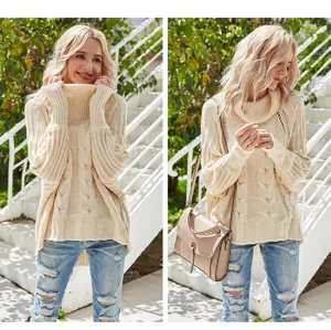 Cozy cream cable knit turtleneck sweater with batwing sleeves, stylish casual women's winter top.