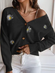 Stylish women's V-neck knitted cardigan featuring cute daisy embroidery. Perfect cozy autumn wear.