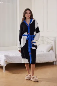 Cozy thickened plush hooded loungewear robe with contrasting color block design and belt.