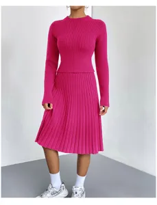 Women pink ribbed knit sweater and pleated midi skirt chic two piece matching outfit set.