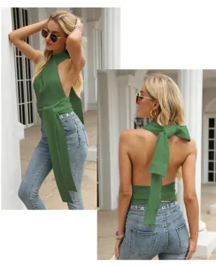 Detailed view of the green halter knit backless top showing back bow and strap design.