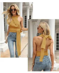 Detail view of the elegant yellow halter knit top featuring a chic backless design and long tie.