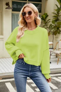 Oversized crew neck knit sweater for women, stylish long sleeve casual pullover top.
