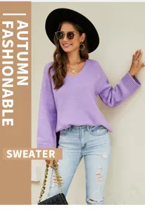 Detailed view of women's long sleeve V-neck knit sweater in soft purple, casual style.