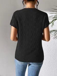 Back view detail of women short sleeve black knit sweater featuring subtle check pattern.