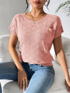 Detailed close-up view of women's short sleeve knit t-shirt featuring chic textured pattern.