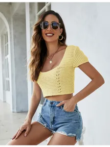 Yellow crochet knit crop top detail, short sleeve hollow out design for summer fashion.