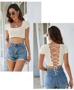 Crochet crop top with lace-up back and short sleeves. Stylish knitwear for women.