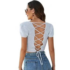 Light blue knit crop top for women featuring a lace-up cross back and short sleeves.