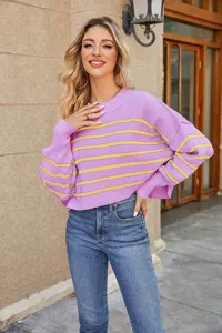 Close-up detail of the purple and yellow striped knitted sweater, soft fabric texture.