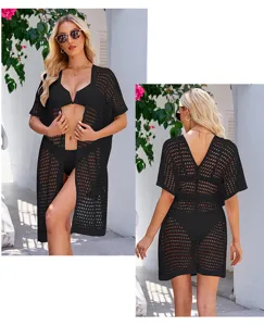 Detailed view of the black hollow knit crochet beach cover-up cardigan back and front style.