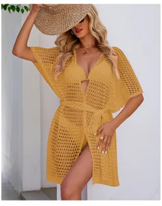 Women hollow knitted beach cover up summer casual solid color short sleeve cardigan top.