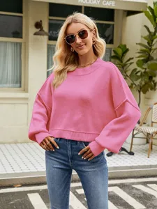 Women casual pink knit sweater, fashion loose long sleeve round neck pullover top.